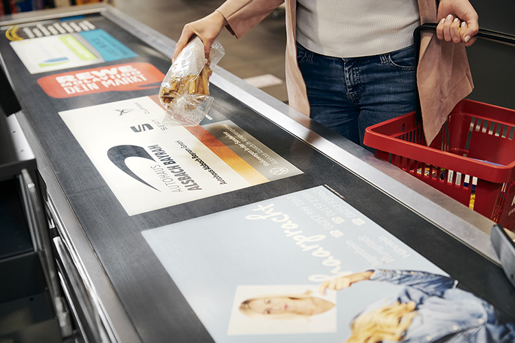 Kassenhelden - Referenz Kassenband im Supermarkt